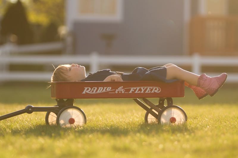 child napping in wagon