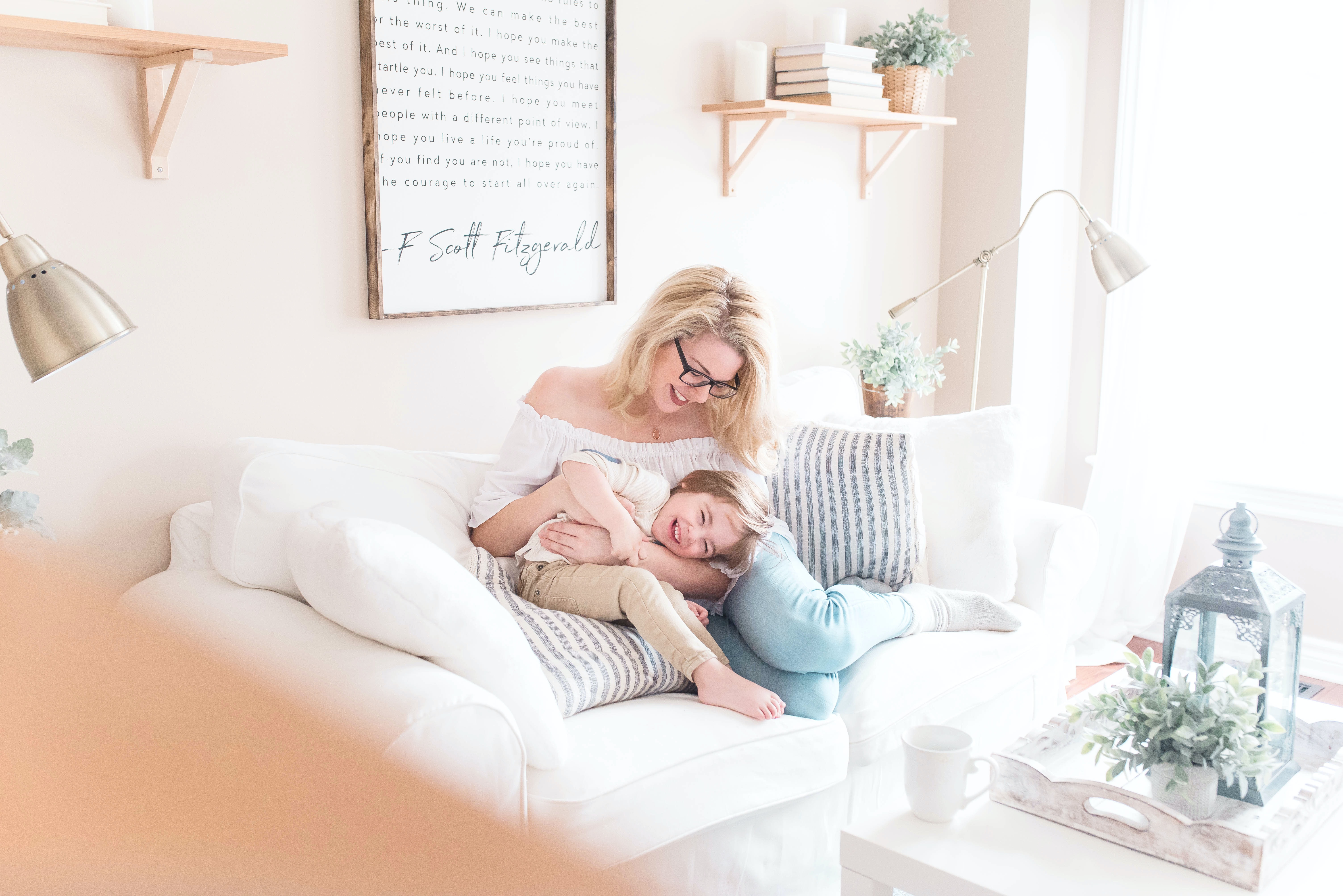 Mom and Son Laughing On Couch